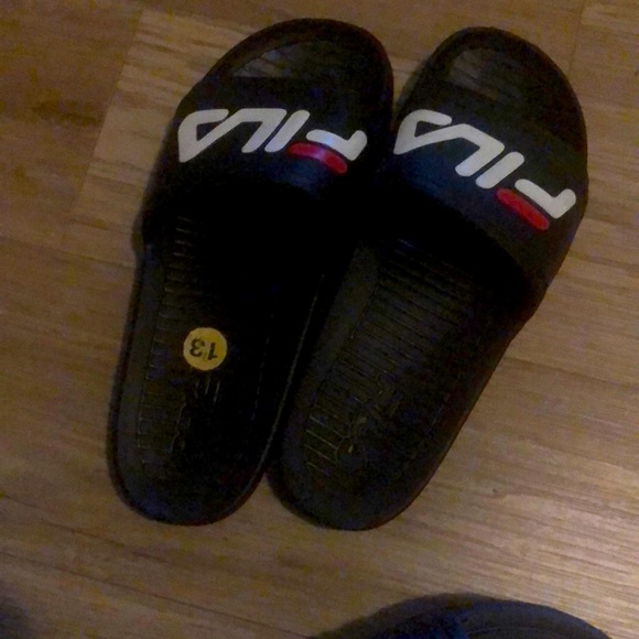 Brand new FilA slides. Been bought and tried em on today and can’t fit. - Picture 1 of 4